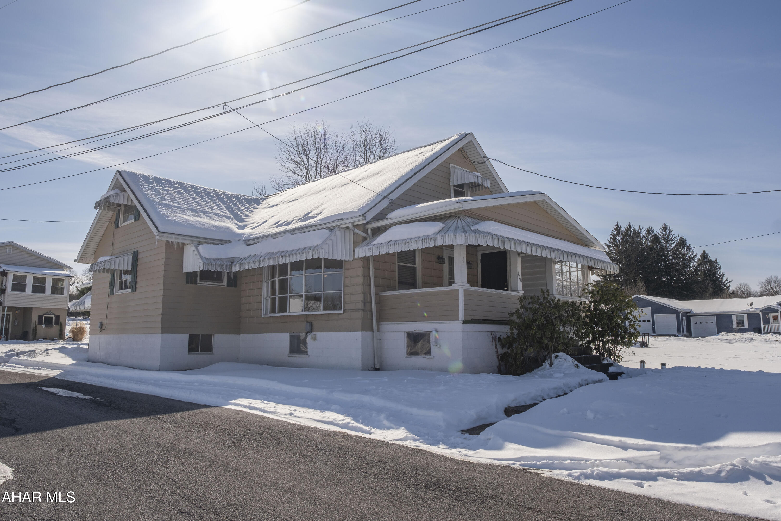 Cute and full of character, this 3-bedroom home (one bedroom is captive) offers warmth, functionality, and the perfect opportunity to make it your own. Beautiful hardwood floors , highlighted by a large bay window that fills the living space with natural light. The huge eat-in kitchen is truly one of a kind, featuring a large pantry cabinet, unique built-in food storage drawers, a desk area, and a new built-in gas range with double ovens—custom designed by a previous owner and rich with vintage charm. A convenient first-floor laundry adds everyday ease. Enjoy additional living space in the large enclosed patio, ideal for relaxing or entertaining. Major updates include a newer roof, newer gas furnace with central air, and new electric panel. With just a few personal touches, this inviting property offers a wonderful place to call home.