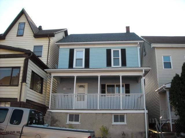 Attention! Here is an nicey updated home, ready to for you to move into.  Newer oak kitchen, 2 baths (half in bsmt), 100 amp electric, copper plumbing, vinyl siding, GFA heat (approx. $125/mo), off street parking on a good level yard, and lots of laminate flooring (pets or allergies?). Logan Elementary!  To top it off, a home warranty to offer protection for 1 year after your ownership.  This home has a large dining room for large gatherings! Great for the cooks out there! Very large heated 4th BR on 3rd floor too!! Cable & Phone hookups seem everywhere! Don't miss it!!!