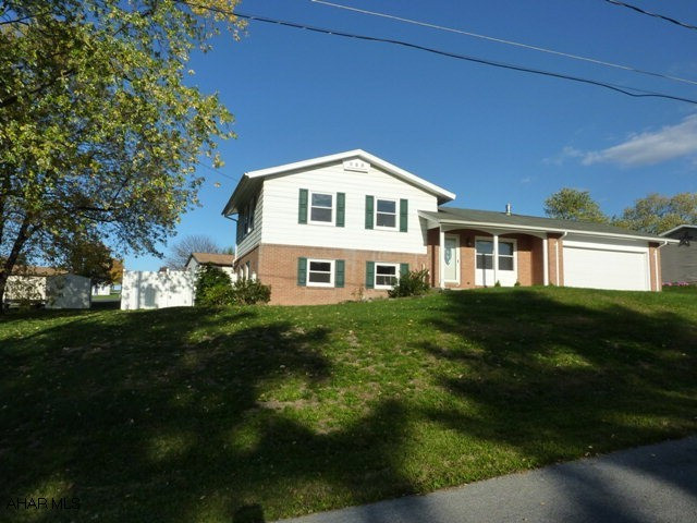Large multi-level with 4 bedrooms with 2 1/2 baths.  3rd totally refurbished. Home features all new kitchen, new bath and large family room w/fireplace. Back yard has large above ground pool and pond w/fish.  Lots of sq. feet and priced to sell.