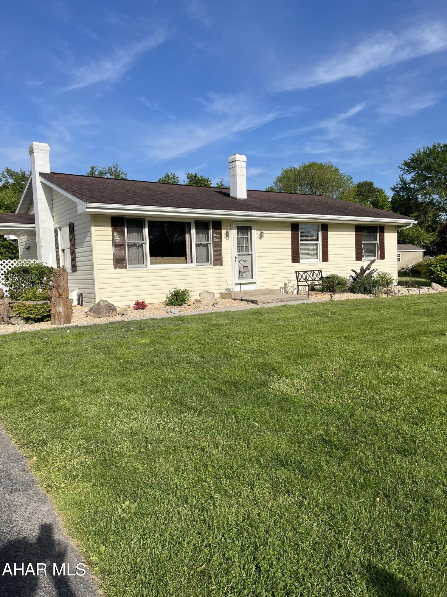 Spacious 3 Bed, 2 Bath Ranch with addition, large Family Room, Den & Summer Kitchen.  Detached oversized garage could be 2 car but currently has large workshop. Situated on beautifully landscaped 1/2 acre.