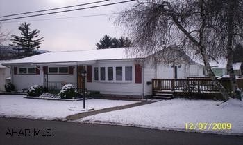 Rancher, 3 bed, 1.75  Bath, Kitchen- Dining comb, Living Room, Full finished basement. Corner lot, very clean, good mechanics, move in condition, Sun Setter Awing, ESP security system, gas fireplace, large deck on back, off street parking.  Laundry area, comes with range, dishwasher and window treatments.
