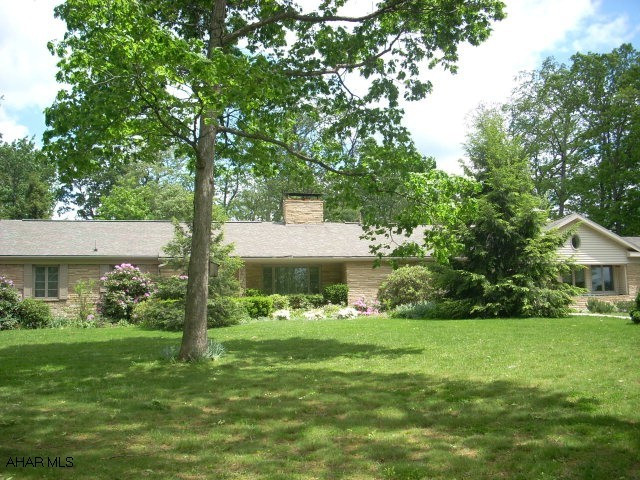Large stone & vinyl rancher in secluded location.In-ground pool & bath house(not used), family room with gas-fired woodburner & heated floors! Sun room with fireplace & heated floors!