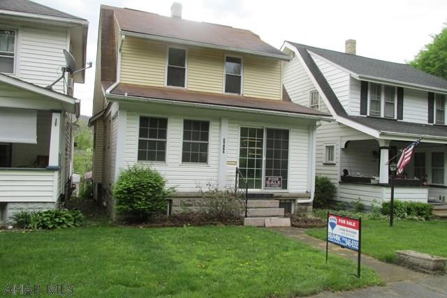 Super Starter-nicely updated-hardwood floors, new windows, tiled bath-just needs your finishing touches! Small yard, fenced w/ garden shed. Oversized 1 car garage, central air + 3 window units, off street parking at alley. Ready for immediate occupancy. Taxes are estimated.