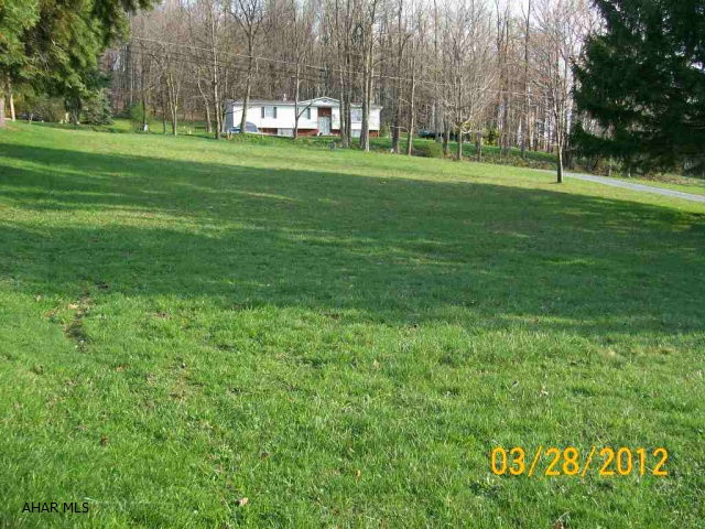 part of tax id # 21-26-101 Sewage tap in fee is $1,500 and water tap in is $750.00.  Access to lot is granted from Penndot.