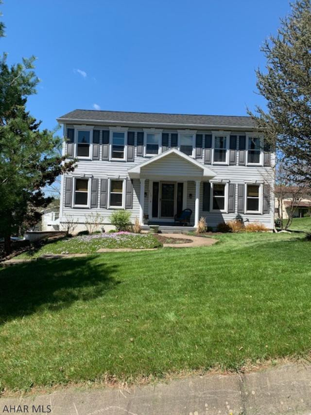 Stunning 4 bedroom home with a breathtaking view of Hollidaysburg from large covered deck.  Totally remodeled kitchen, with large granite island and hardwood floors.  Spacious rooms throughout with abundance of storage.  All on flat landscaped lot.  New roof, windows,furnace, hot water tank, radon mitigation, and water softener.  Included gas stove, dish washer, microwave, refrigerator, refrigerator in garage and electric fireplace.