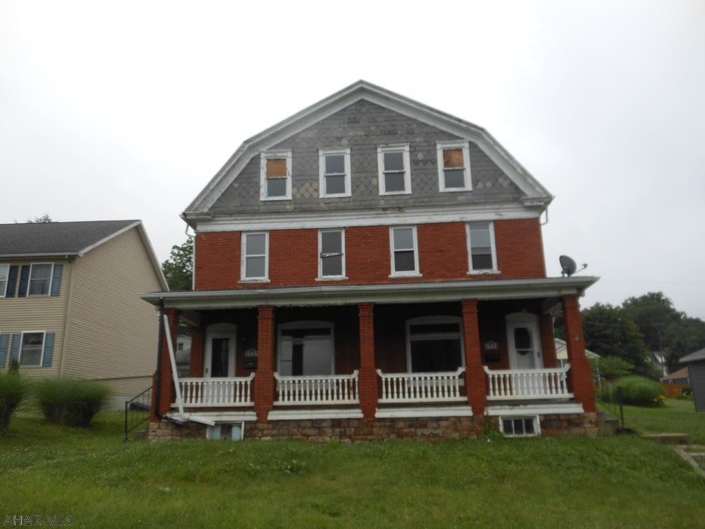 Very large double house. Mostly brick house with an addition on 5527 unit in the rear that is vinyl. Handyman special. Both units have heated attics that can be used as living space.  Separate electric and gas. Partially unfinished and can be customized. Some electric and plumbing are missing.