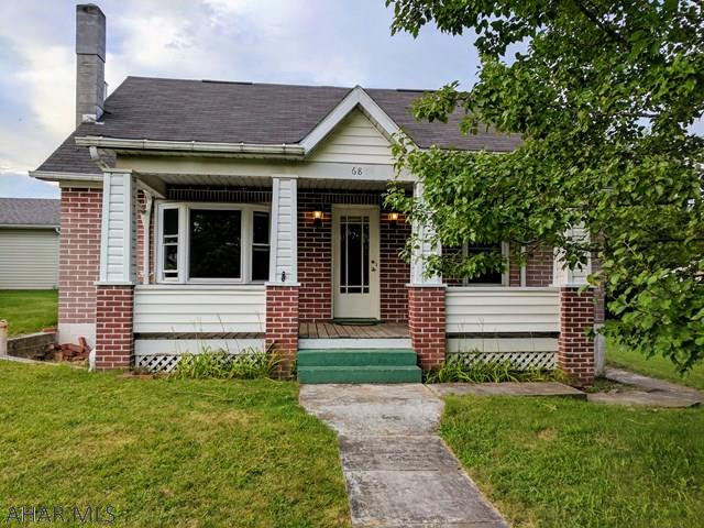Three bedrooms, 1.5 bath home in a nice neighborhood!  Hardwood floors throughout and a nice level backyard leading to a garage with workshop area.  Garage will have a new metal roof before closing, so start planning the perfect workshop area to keep your hobbies in their own special area.  If you're looking to eliminate steps from your daily routine, this place will check those boxes. Bedroom, full bath and laundry on first floor. The second floor also contains 2 additional bedrooms and a massive closet in the open hallway/stairs. Interior completely repainted and home is in total move-in condition. Schedule to see this one today!