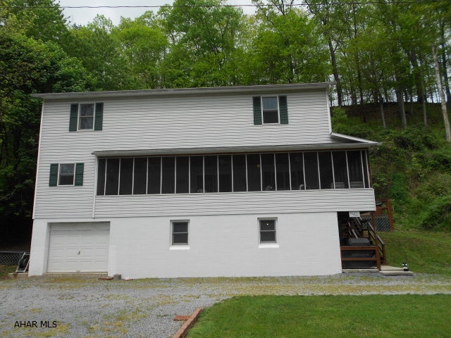 River front- simply lovely- purchase and just move in your personal items. A must see for all your relaxing needs. Well built, well kept, easy to maintain. 3 levels of space, plenty of bedrooms and 2 baths. Open floor plan on main level and wrap around screened porch.