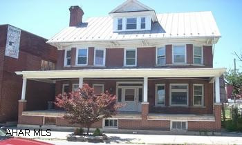 4 bedroom brick, needs some work. Zoned residential - commercial. Many uses.