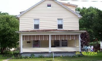 Large 2 story home with finished attic. Nice size yard w/1 car detached garage. A lot of original woodwork & charm. Basement has sump pump.