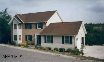 2 TOERED DECK. VAULTED CEILING IN MASTER BEDROOM. JACUZZI STYLE TUB. CEMENT DRIVEWAY.