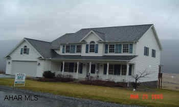 SIMPLY STUNNING HOME in fabulous Scotch Valley. Huge, spacious kitchen with center island and pantry, master suite w/Jacuzzi tub, 1st floor family room, fantastic covered deck w/great view, finished basement. Check it out!