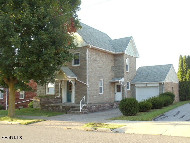 Beautiful stone home with lots of character, 2 sets of pocket doors, built-in bookcases, 1st floor laundry, finished attic, central air, private back yard with screened in back porch.  Lot sizes are 50x150 & 100x50.  #J-014