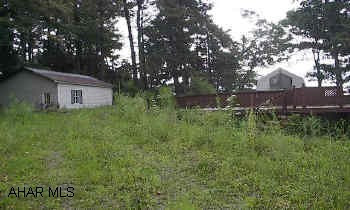 3 ACRES WITH WELL, SANDMOUND, BARN/SHED, GARAGE, ABOVE GROUND POOL AND POOL HOUSE/WORKSHOP.  FENCED. GREAT FOR HORSES.  3 ACRE WITH  PRIVACY AND GREAT VIEW. HOME BURNED, BUT OUTBUILDINGS AND UTILITIES THERE.  CALL DARLA 696-1227 OR 934-4663.  MUST HAVE APPT.  NO DRIVEBYS.