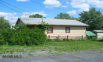 One BR Bungalow with FHA heat. Needs Work.