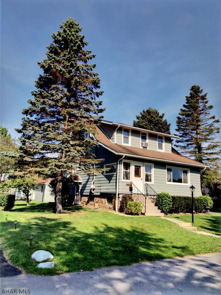 SOOOO HOMEY! This spacious corner lot home has so many extra little conveniences aside from it being as cute as it can be! Built-in shelves, nice closet space, EIK, 3 car detached garage, BAKER SCHOOL, covered deck, radon mitigation system in place, pavilion area out back, sun room that makes a great toy room or office, off street parking AND 3 car garage, great space in the basement that was once finished and can be again! Very large kitchen and bathroom give the much needed space a family needs. Can't beat this BEAUTIFUL location check it out Today.