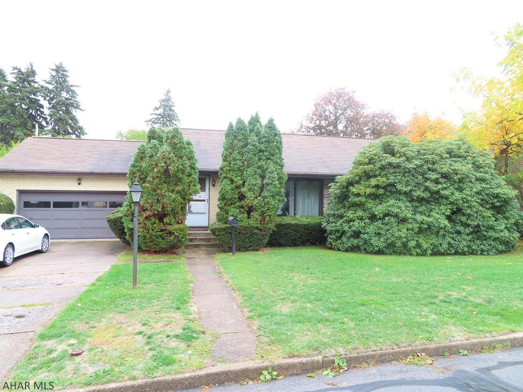 Great home with a large yard. A nice 3 bedroom ranch home with a large living room with a fireplace and flowing into the kitchen and dining area. The 3 bedrooms are off the living room with a full bath positioned in the center. A large rear covered patio runs right into a large grassy yard with a shed in the rear of the 18,000 sf lot.   Property is Agent owned.