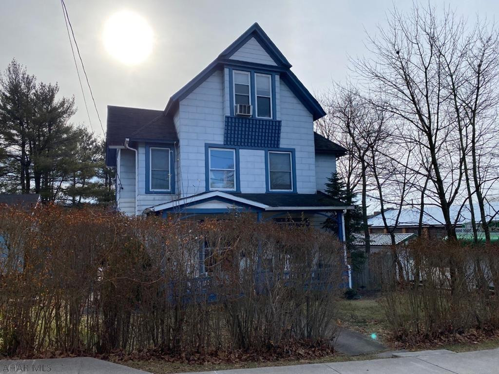 Quality two story- open living and dining room area, bonus room on the main floor for bedroom or office, main floor laundry, hardwood floors, finished attic with vaulted ceilings, fenced in yard, needs some tlc