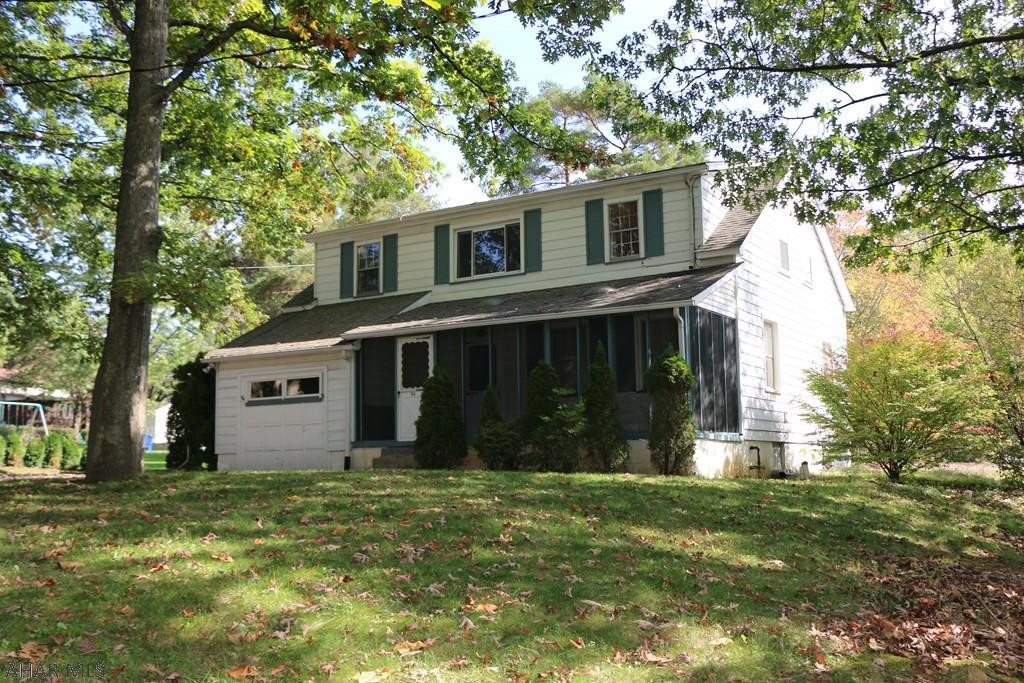 Charming 4bd 1.5ba 2 story home on Brush Mountain Rd. in Hollidaysburg!!  Hardwood floors though out, Screen in front porch and plenty of trees for shady enjoyable afternoons, Hot water heat and a car port for 2!  Needs alittle TLC, MOTIVATED SELLER MAKE AN OFFER!!