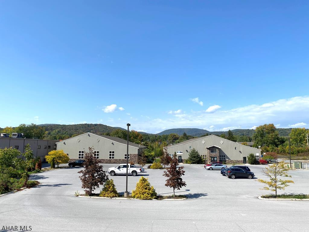 Sports Complex with 5 offices on over 4 acres of prime real estate for sale. These two buildings were built in 2009 and have a large parcel still available to be developed. All suites ahve separate electric and tenant gas meters. There are over 125 parking spaces. Conveniently located to Rt 764.