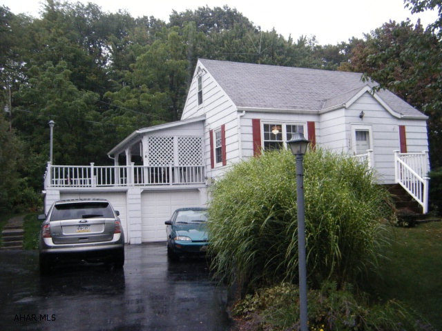 Home is ready for updating but has all the neat features of a cape cod...exterior design appeal, nice yard, economical home size, garage with large patio over. Windows are 5 years, furnace 14 years. Basement has a rec room with concrete floor.