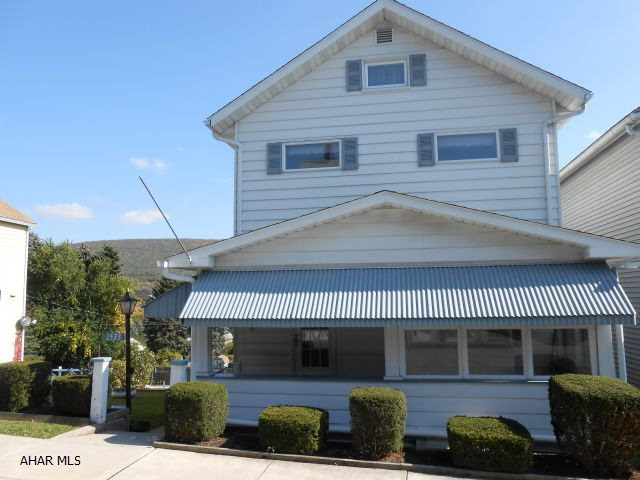 This home offers a great value for your dollar and has so many added benefits for any home buyer. It opens to a spacious living room beaming with natural light. The 1st floor has a kitchen, dining room, family room, half bath and an office which you normally do not find in this price range. 3 Bedrooms, 1 bathroom and steps leading up to a full size attic. Downstairs provides a 1/2 bath and huge amount of space for storage or you could turn this area into a den! There is an amazing amount of living and storage space for this well priced home. Downstairs also offers a perfect wood working area. The screened in back porch is huge and the options are limitless as to what you can so with it. A large garage and carport located in the back of the house.