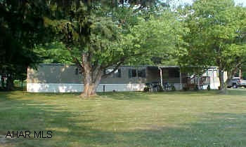 Very well maintained mobile home on over a half acre. Many updates. Great buy.    14x70 mobile home resting on over half an acre. Lots of new updates. Convenient to everything.