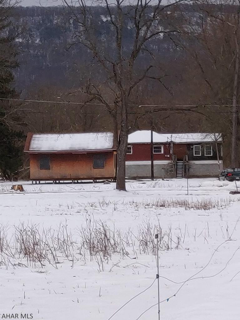 Excellent opportunity for a Homesteader, Outdoorsman, Handy Man, or Adventure Seeker. Great Location near the River. Raised Ranch with 2 BR, 1 Bath. Needs TLC but has real potential. Close to Hunting and Fishing and Canoe Creek. Country Living at its best in Hollidaysburg Area School District.