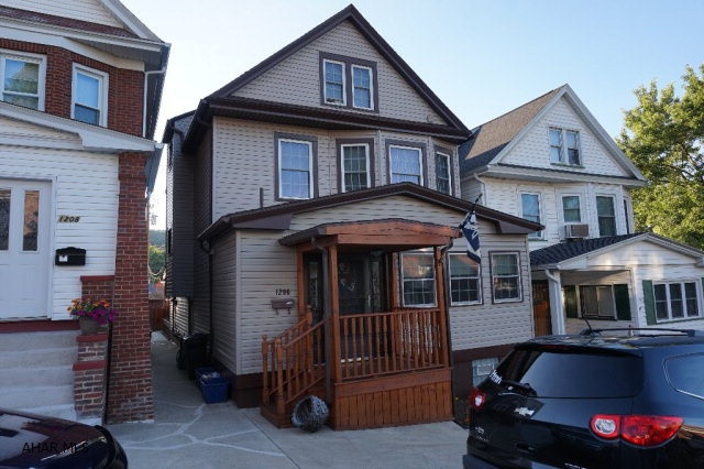 Beautiful, beautiful, 3 bedroom, 1.5 bath two and a half story. Open and spacious dining room and kitchen, living room. Half bath and bonus entrance room area on the first floor. Very attractive inside & out. Incredible covered deck. Off street parking. This is a great property.