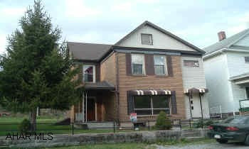 Nice Looking Brick and Vinyl 2.5 Story Nice House with Large New-Looking Kitchen, Some recent paint, & New Carpeting - Nice Neighborhood - Must See!