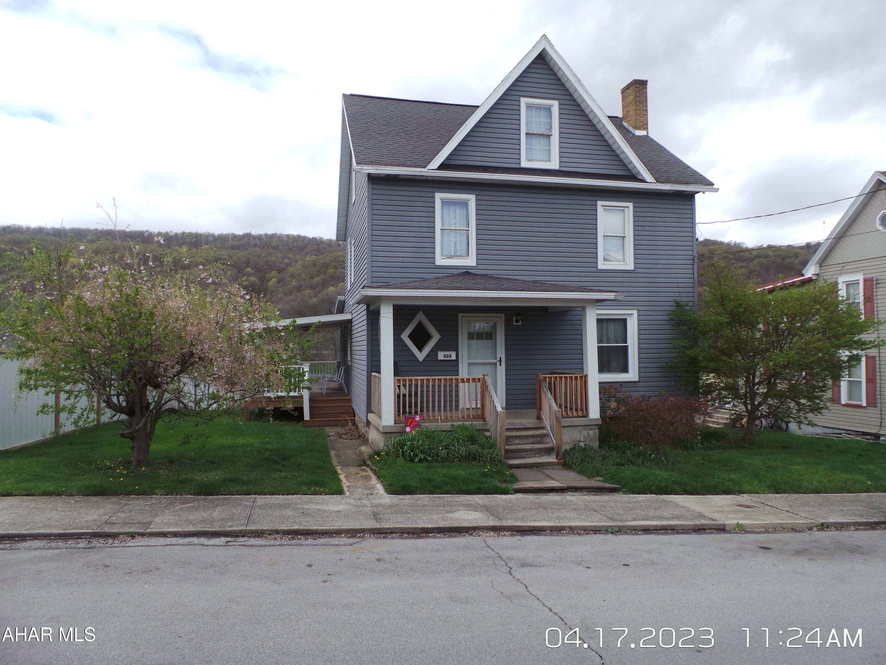 Vinyl sided home w/ 3bdr, 2 baths and finished 3rd floor for 4th bdr or bonus room.  First floor laundry in the 3/4 bath.  Bonus room off kitchen for extra space.  Enjoy the summer on the covered side porch.  A 3 car garage is also included.  New hot water tank to be installed.