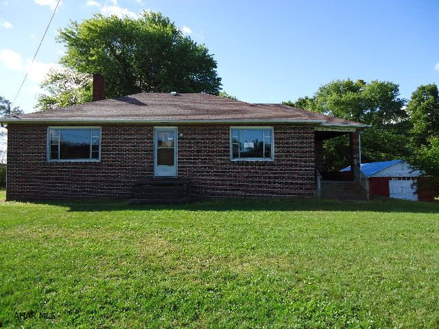 1 story brick on 1 acre - Eat in kitchen, hardwood floors., electric baseboard heat, bank owned. Property has public sewer at road but not connected to house. Property ios sold AS IS. Buyer must hook on to Public Sewer. Will need approx 50 ft. latteral run to house and pay $50.00 inspection fee. Sewer cost is $49.00 per month.