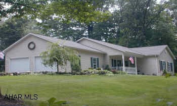 Ranch style home on 4.302 Acres. 3BR/2 full bath, main level laundry. Beautiful landscaping.  Home warranty included. Horses OK