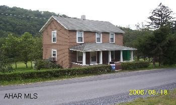 2 STORY HOME ON .3 ACRE IN SUSA. TWP. WITH SMALL BARN & FRUIT TREES GREAT STARTER HOME
