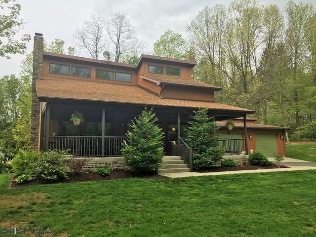 What a gem! Outstanding contemporary home in a great location. Pristine condition from the home's well maintained exterior to the immaculate landscaping. Amazing outdoor living with spacious front porch, professionally done patio, playset for the kids and campfire ring for fun evenings at home. Master bedroom and full bath on first floor, 2 bedrooms and full bath on second floor, 1 bedroom and full bath in basement. Great room and loft area creating the wow factor. Finished rec room/man cave in basement with wood burner. This truly is the home of your dreams!