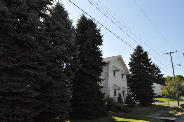 VERY NICE 2 STORY LOCATED IN PLEASANT VALLEY FEATURES 3 BEDROOMS ,FINISHED BASEMENT CURRENTLY USED AS A 4TH BEDROOM COULD BE A FAMILY ROOM.THERE IS A 3/4 BATH IN THE BASEMENT,A CLOSED IN SUN PORCH2 CAR GARAGE WITH WORKSHOP.