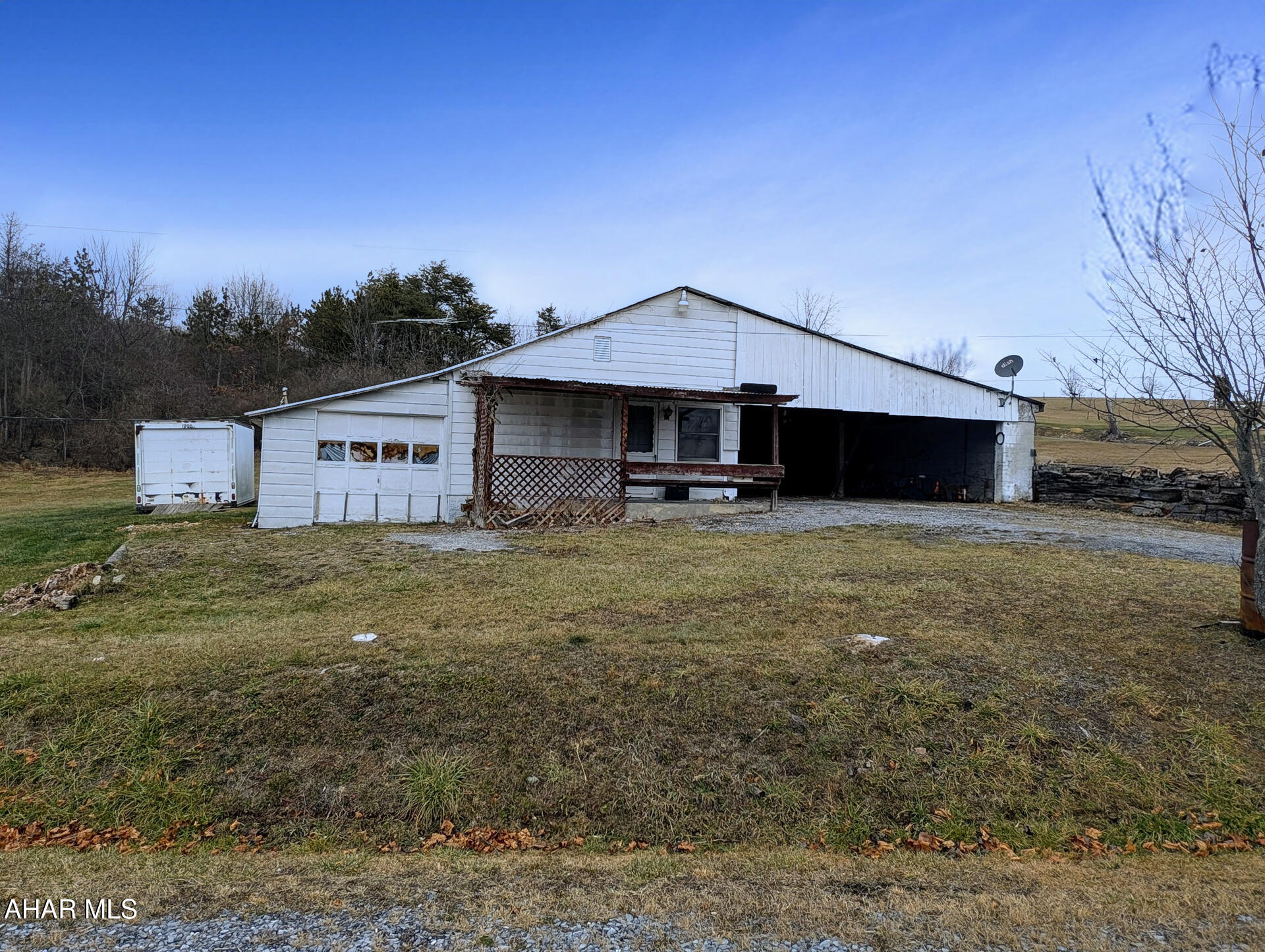 Ideally situated on Country Ridge Road, this 1.03 acre lot presents a unique chance to create your dream home. Either renovate and expand the existing single-wide residence or clear the land and build a new home tailored to your preferences. The property's flat terrain and scenic views are complemented by a well, septic system, and electricity already on site. With its convenient location off Route 30, you'll be within easy reach of lakes, trails, hunting, major highways, and local amenities. Property has been winterized.