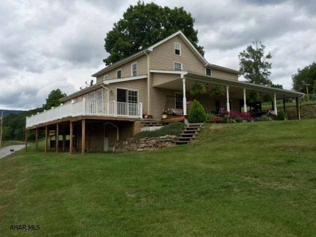 Exceptional 3 bedroom, 3 bathroom Farmette located on 48 acres in the foothills of the Alleghany Mountains in historic Bedford County. The home has been meticulously maintained and updates include renovated kitchen, sunroom and bathroom addition, wrap around porch, covered porch and much more. Miles of trails take in gorgeous vistas. A oversized three bay garage plus a large car port and a small barn complete the property. Presently used to raise beef cattle and blueberries. Priced to sell.