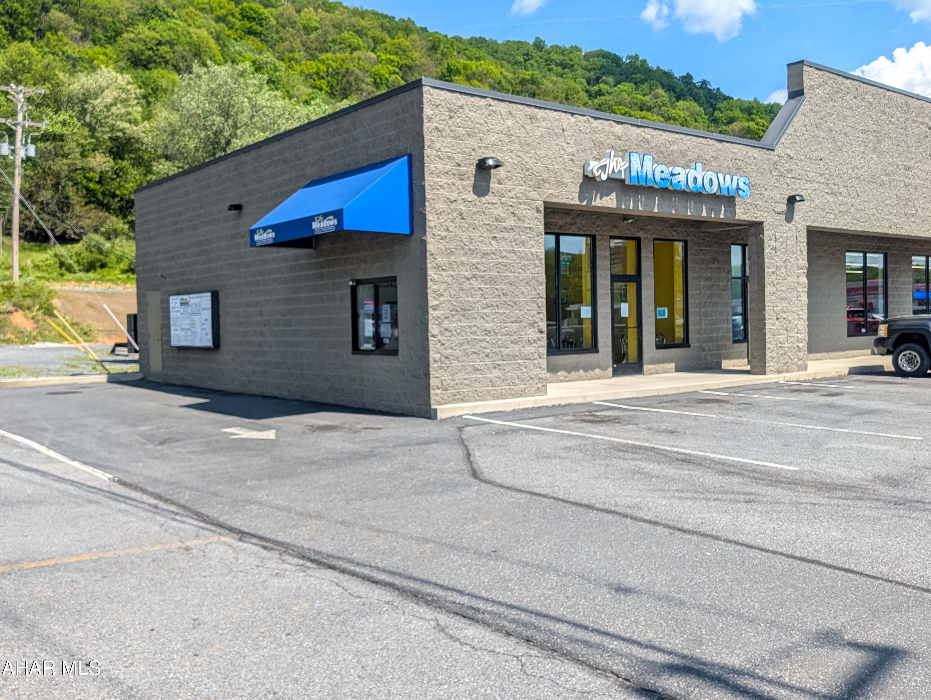 Located in a high-visibility plaza along a busy main highway, this established ice cream business offers an outstanding opportunity for an owner-operator or investor looking to step into a turnkey business.  Benefiting from strong daily traffic counts, excellent signage exposure, and a loyal customer base, the business is well-positioned for continued success and future growth.  Prime location makes it a popular destination for both local and pass -through travelers alike.  Please note - real estate is not included in the sale-  business only.  A rare opportunity to own a thriving business in a sought-after commercial corridor.