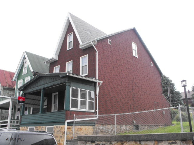 Sweet house with large rooms, 5th BR in finished heated 3rd floor.  Insulbrick siding is in good condition.  Newer windows, wiring, furnace, & hot water tank.  Off street parking for 2-3 cars.  Everything is in very nice condition.