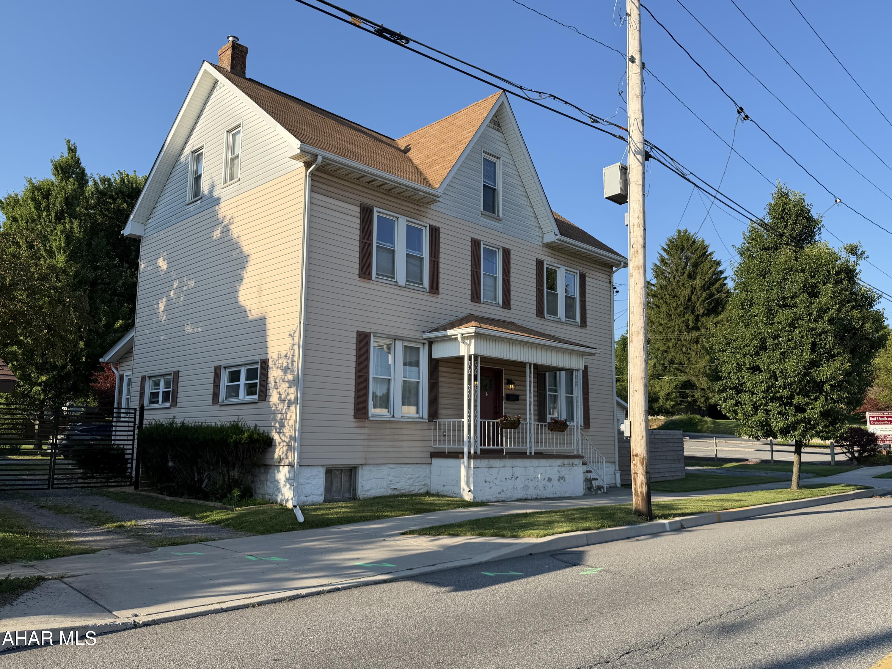 Experience in-town living at its finest with this massive 4-bedroom, 1.5-bath home, perfectly situated in the heart of downtown Ebensburg. Boasting unmatched space, it pairs classic charm with recent modern updates. Enjoy a highly walkable lifestyle just moments from local boutiques, parks, and dining. This home features beautiful architectural details seamlessly blended with newer updates and contemporary fixtures. Many updates to this home which include engineered hardwood flooring in living, dining and family rooms, several walls drywalled and all new lighting throughout. Generous square footage allows for ultimate flexibility. Create a home office or two, or have guests stay. The walk up attic has potential for adding several rooms or additional family living spaces. The current owners have fenced the entire yard allowing for peace of mind while using the spacious backyard and outdoor entertaining areas. The oversized 2 car garage is perfect for your vehicles and gadgets. Call today to see this great home!