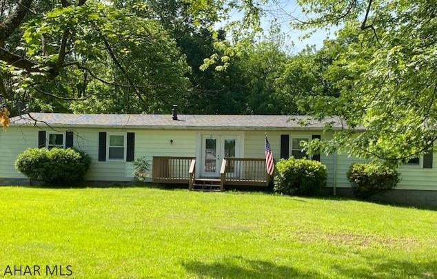 Beautiful ranch home backs up to Dunnings Creek.  Three bedroom, 2 bath home with large living room, and family room.  Updated roof and windows, large detached two car garage, large yard, flat lot.