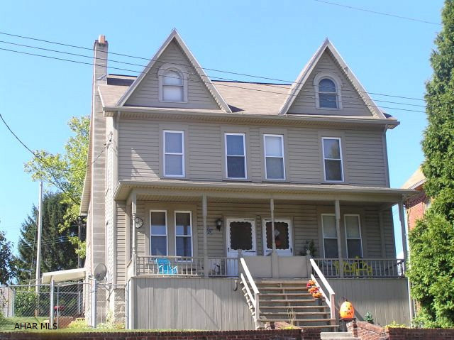 Good looking, well maintained Duplex.  Currently both sides are tenant occupied - move in condition!  Convenient location - near the YMCA.  Oversized detached 2 car garage.  Great price.