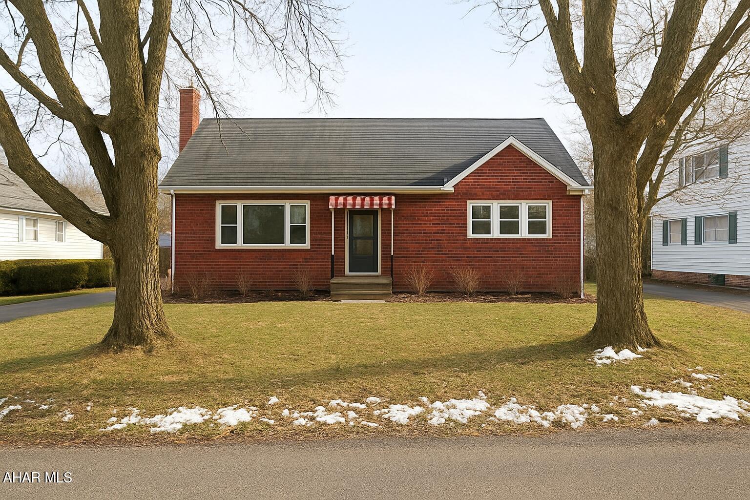 Brick home with double lot (.34 acre) in Hollidaysburg school district. 4 spacious bedrooms with 2 full baths. Wood burning fireplace in the spacious living room with hardwood floors. Large back covered deck. This is a must see.