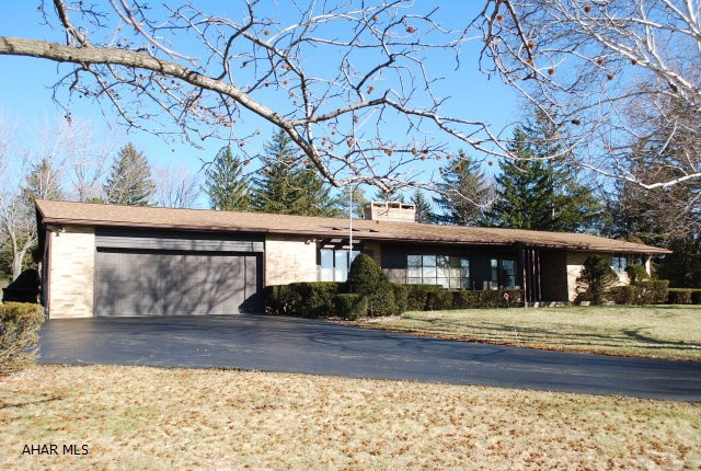 Sprawling brick ranch style home on 2.8 acres in Sylvan Hills.  The location and beautiful views don't get much better than this in the Hollidaysburg School District.   5 bedrooms, 3 baths on main level.  Additional bedroom and bath in lower level.  Family room on main floor and family room with wet bar in basement.  Private back yard.