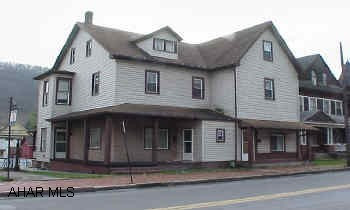 Huge house with 1 BR first floor apartment.  No seperate utilities.  Modern kitchen.  Park behind the house / 1-car integral garage.  Possible flood plain.