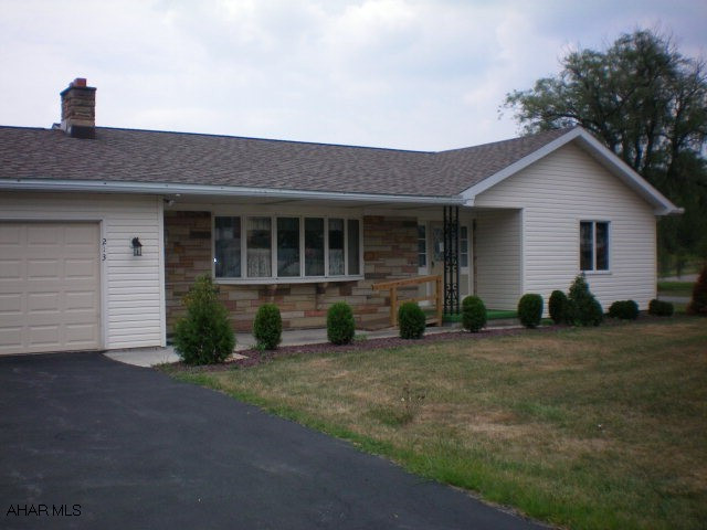 3 BR/ 2 BA Ranch on corner lot.  Large kitchen with bar.  New flooring, newer roof.  Laundry on main floor.  2 car attached garage with new doors and openers.  Large open basement could be finished to double the space.