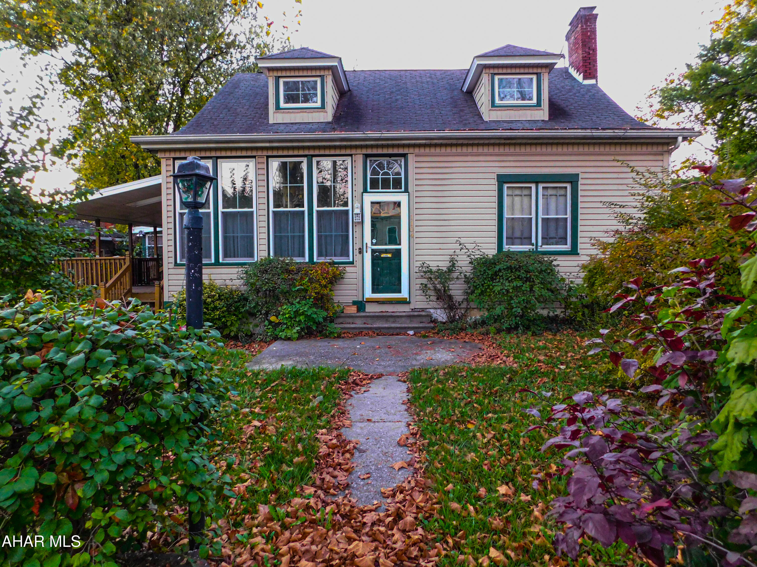 Full of character and original charm, this 3 bedroom, 1.5 bathroom home presents an opportunity to add your personal touch and call it your own.
 You'll love the oversized living room featuring a beautiful stone fireplace.  There are hardwood floors throughout, and the convenience of a first floor primary bedroom and first floor laundry.
Situated on a generous corner lot, there's plenty of outdoor space for gardening or entertaining. 
While the home could benefit from some updates, it provides a solid foundation and classic details that are hard to find.
A great opportunity to own a distinctive property with space, charm, and potential!