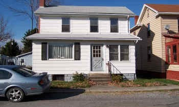 sold "as is" 2 story home needs some TLC in good location.  Large 2 car detached garage.  Property is located in a flood zone.  If agent provides satisfactory evidence at time of offer and closing that buyer is a 1st time home buyer and/or is using an Affordable Housing Program, seller will pay a $1000 bonus at closing to the selling agent. Seller may consider assisting buyer with closing costs.