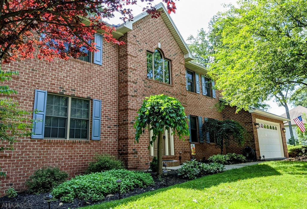 Sylvan East, Spacious family home with room for everyone! 1st floor has a LR, FR, DR, eat-in kitchen, 1/2 bath and laundry. Upstairs you'll find 5 big bedrooms and 2 baths.  Lower level consists of a family room area complete with eating bar and pool table...more space for a toy room, movie watching area and more.  Need a home office? This home also provides that...plus a 3/4 bath for convenience. New doors lead you out to a private patio, play house and water feature, yes there are frogs!  Recent upgrades include freshly painted interior, new carpet and flooring, refinished HW Floors, crown mouldings and more!  Garage boasts a bonus room for bikes, tools or a work shop. Enjoy Summer evenings on the deck over looking the woods and pond, so peaceful and relaxing.  Just move right in.